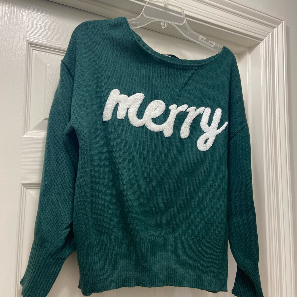 Size small Merry Christmas sweater.